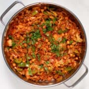 Fresh herbs are used as garnish for Dirty Cabbage.
