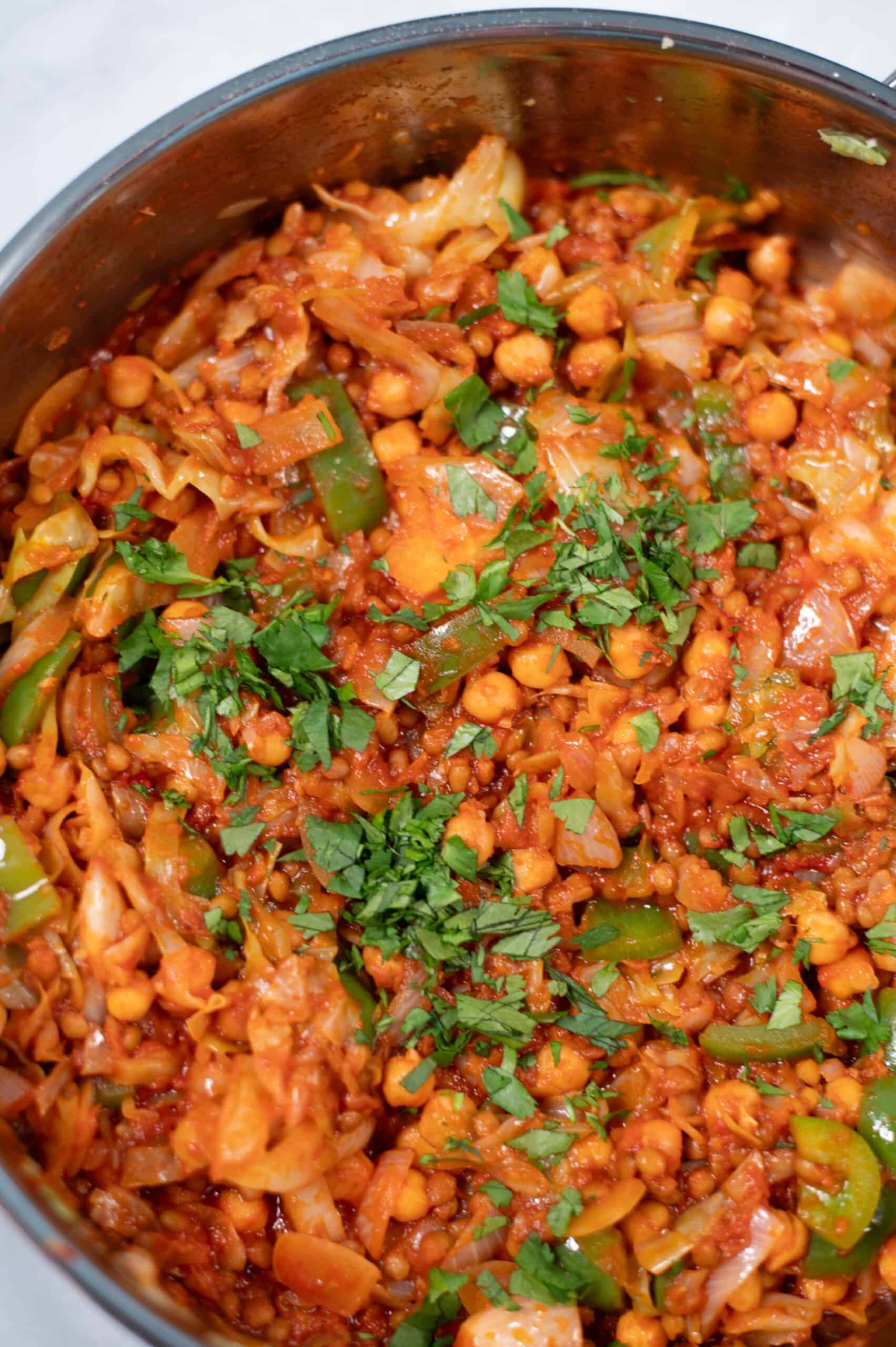 Vegan Dirty Cabbage in a lagr pan.
