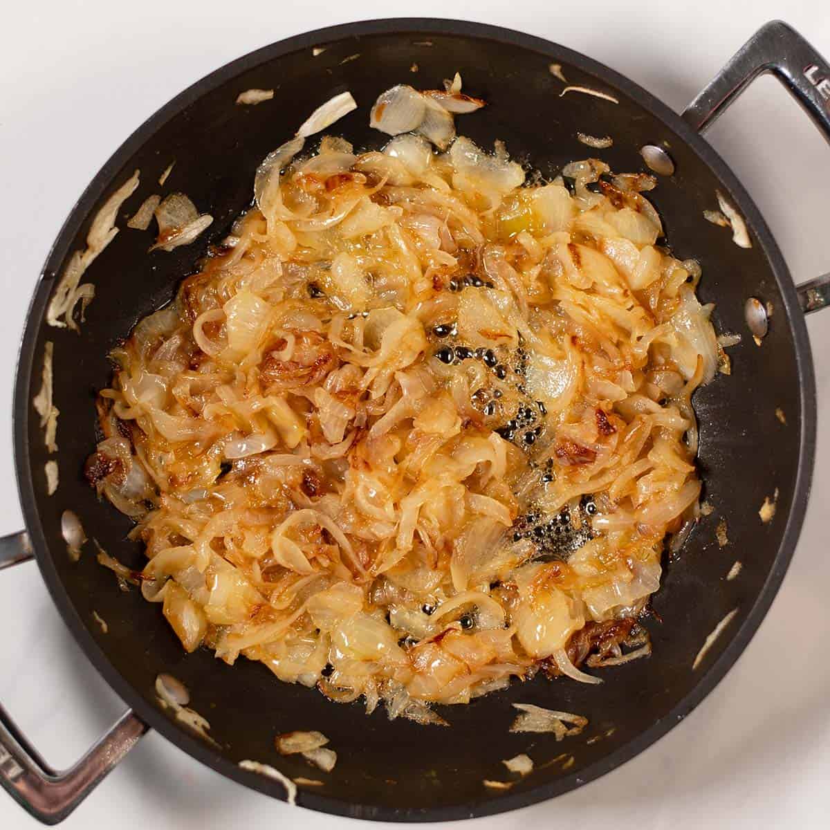 Caramelized onions in a pan.