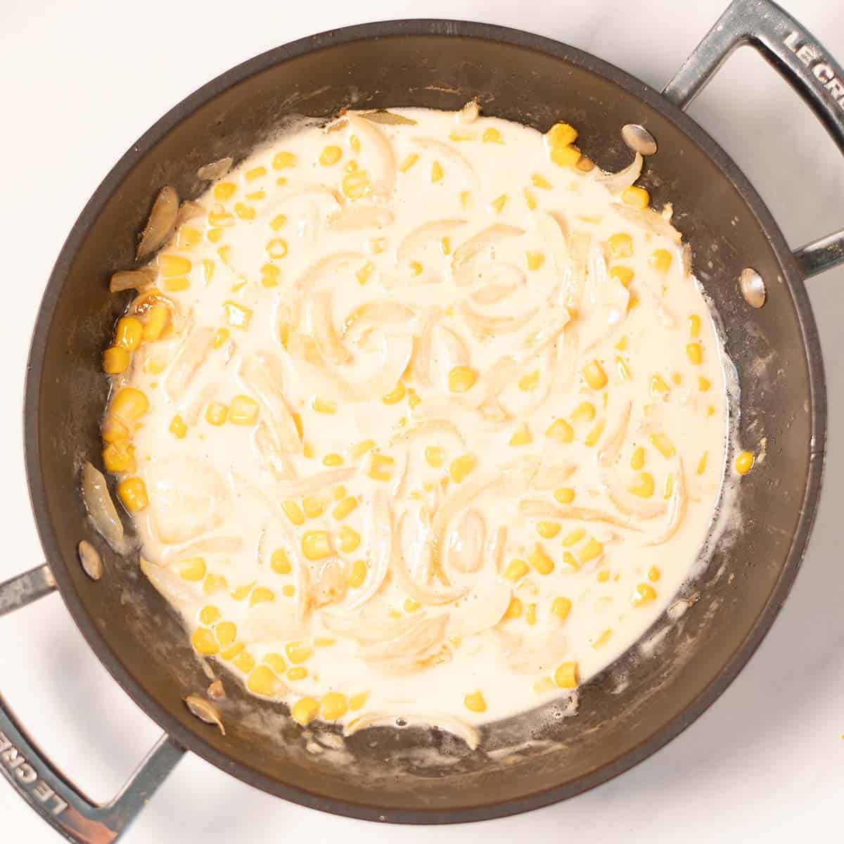 Coconut mik mixed with the onions and corn.