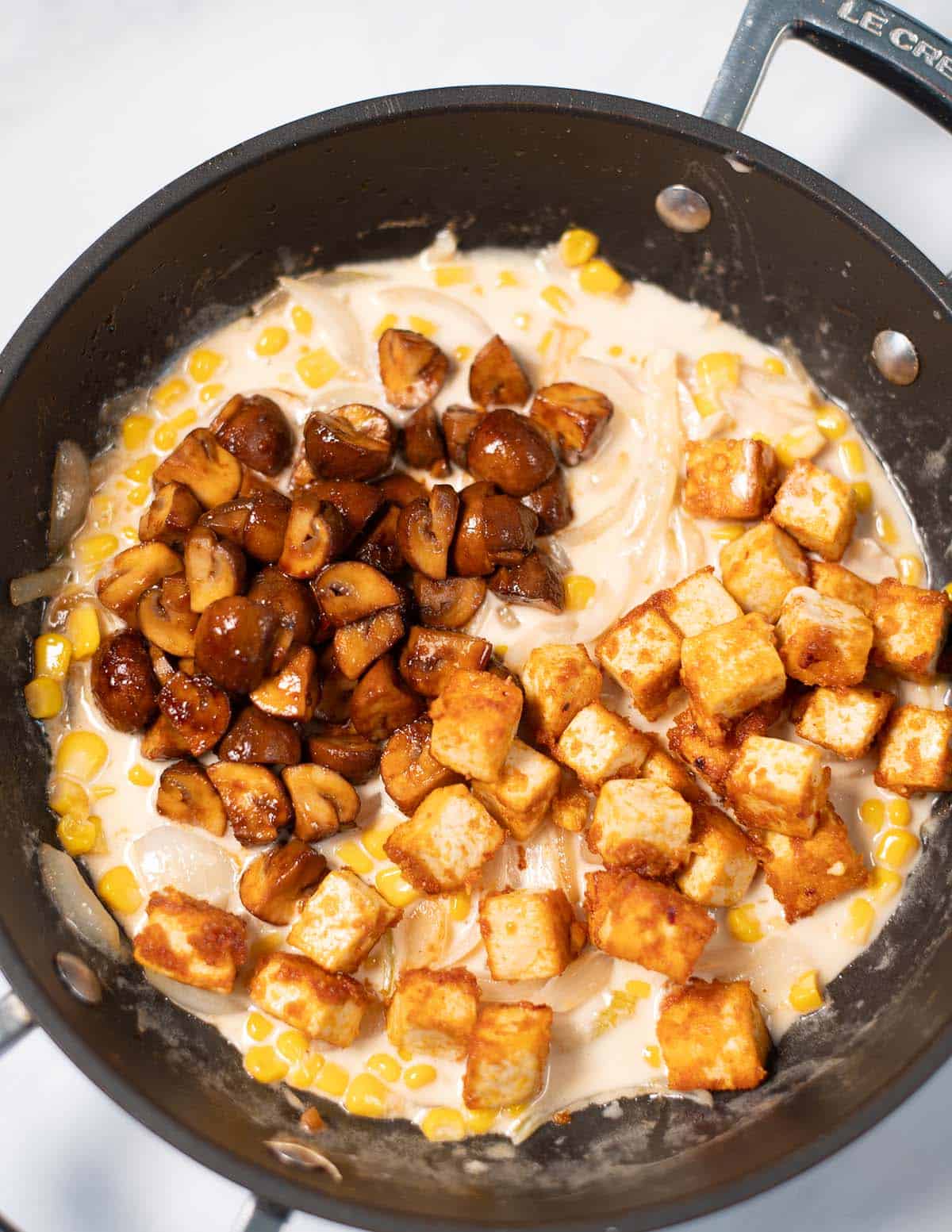 Closeup on a pan with Garlic Tofu.