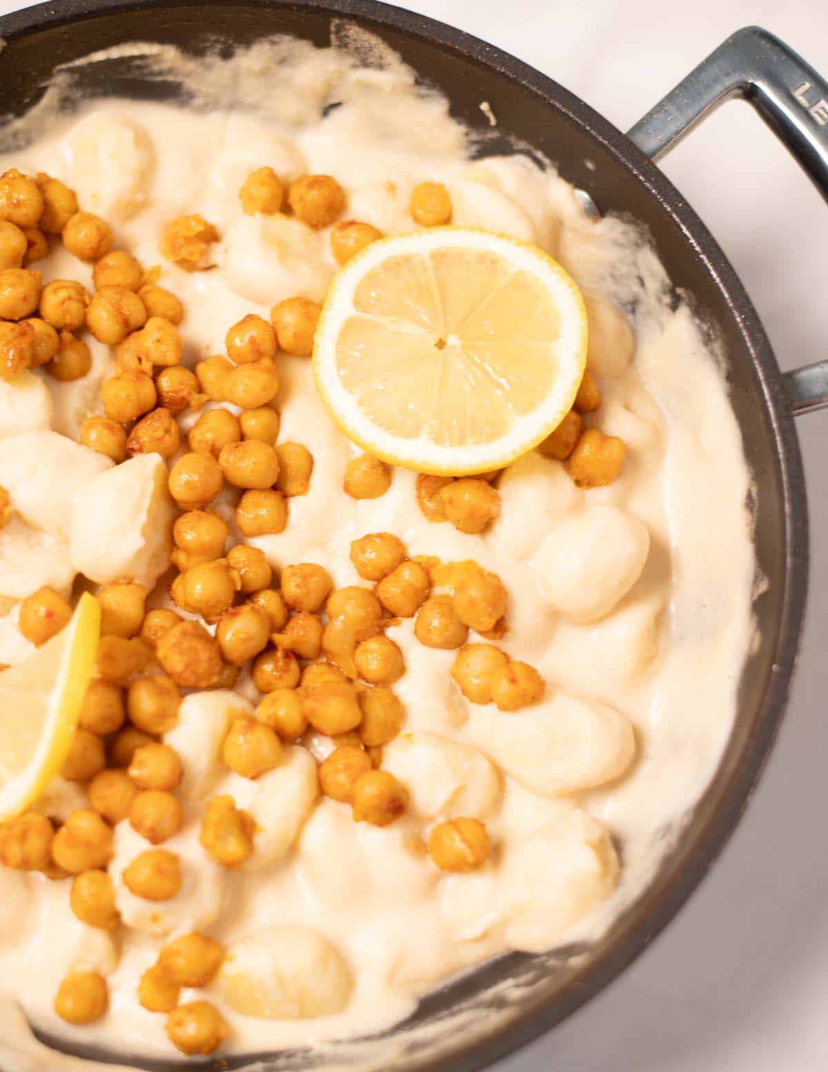 Zoom in on Lemon Gnocchi ready cooked in a pan.