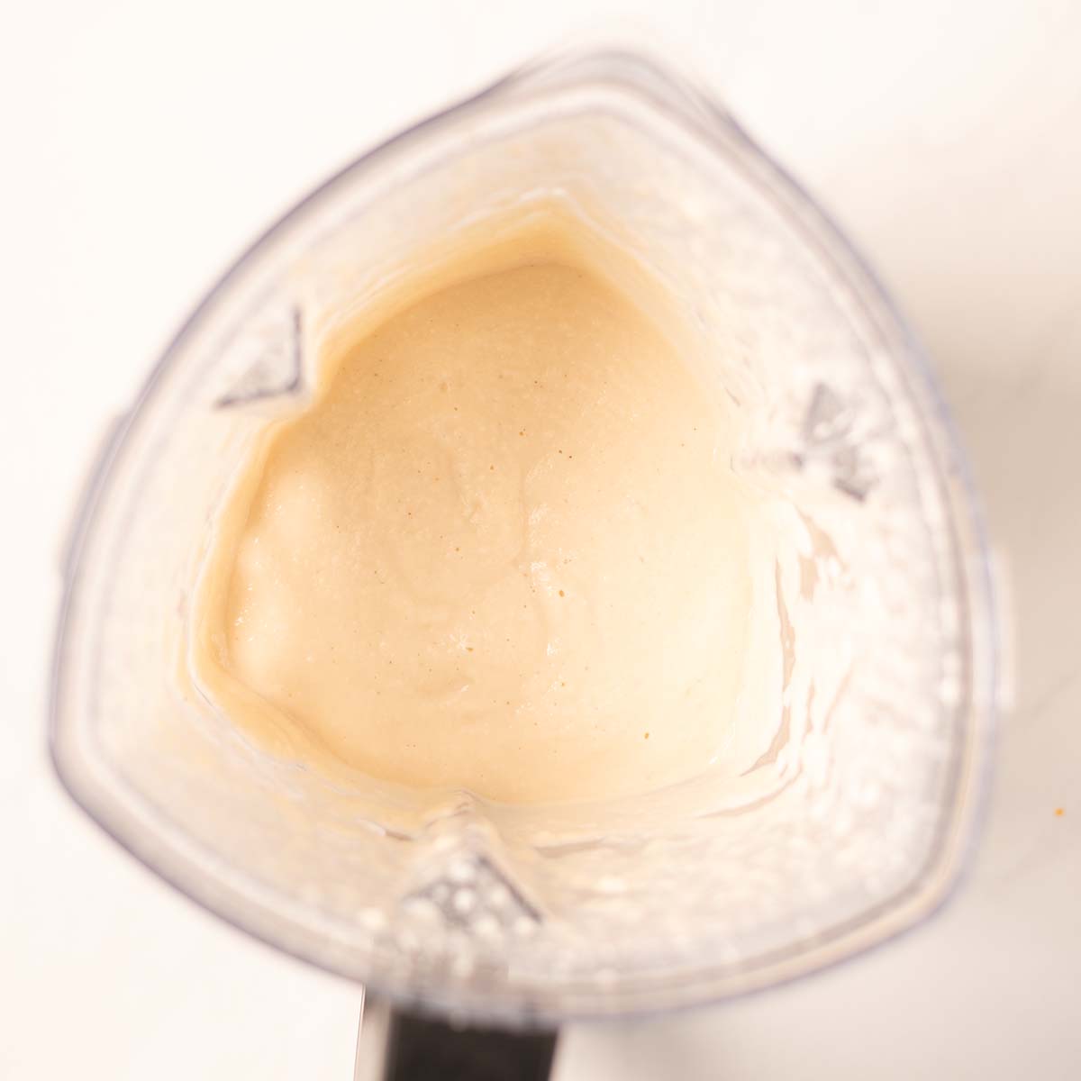 Blenden Bean Sauce in the bowl of a blender.