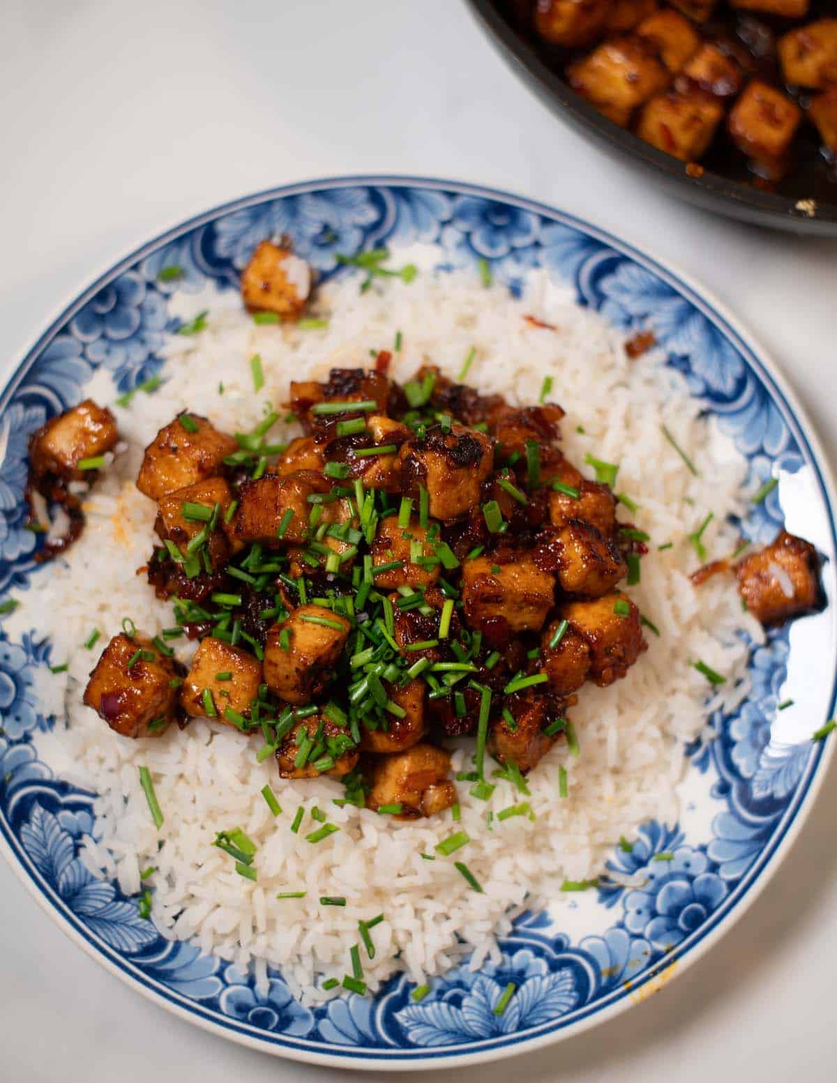 Closeup on Chipotle tofu with white rice.