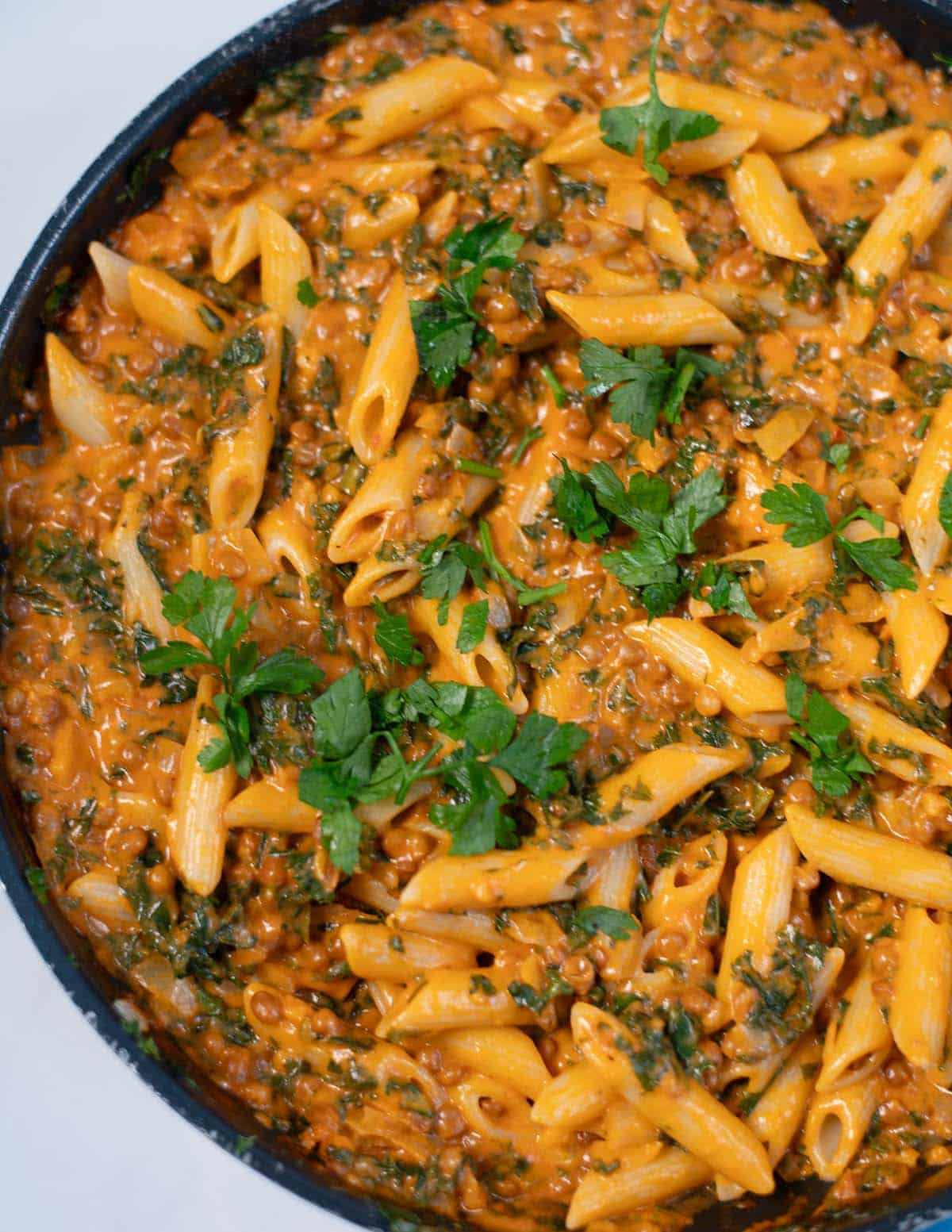 Closeup of Creamy Kale Pasta in a pan.