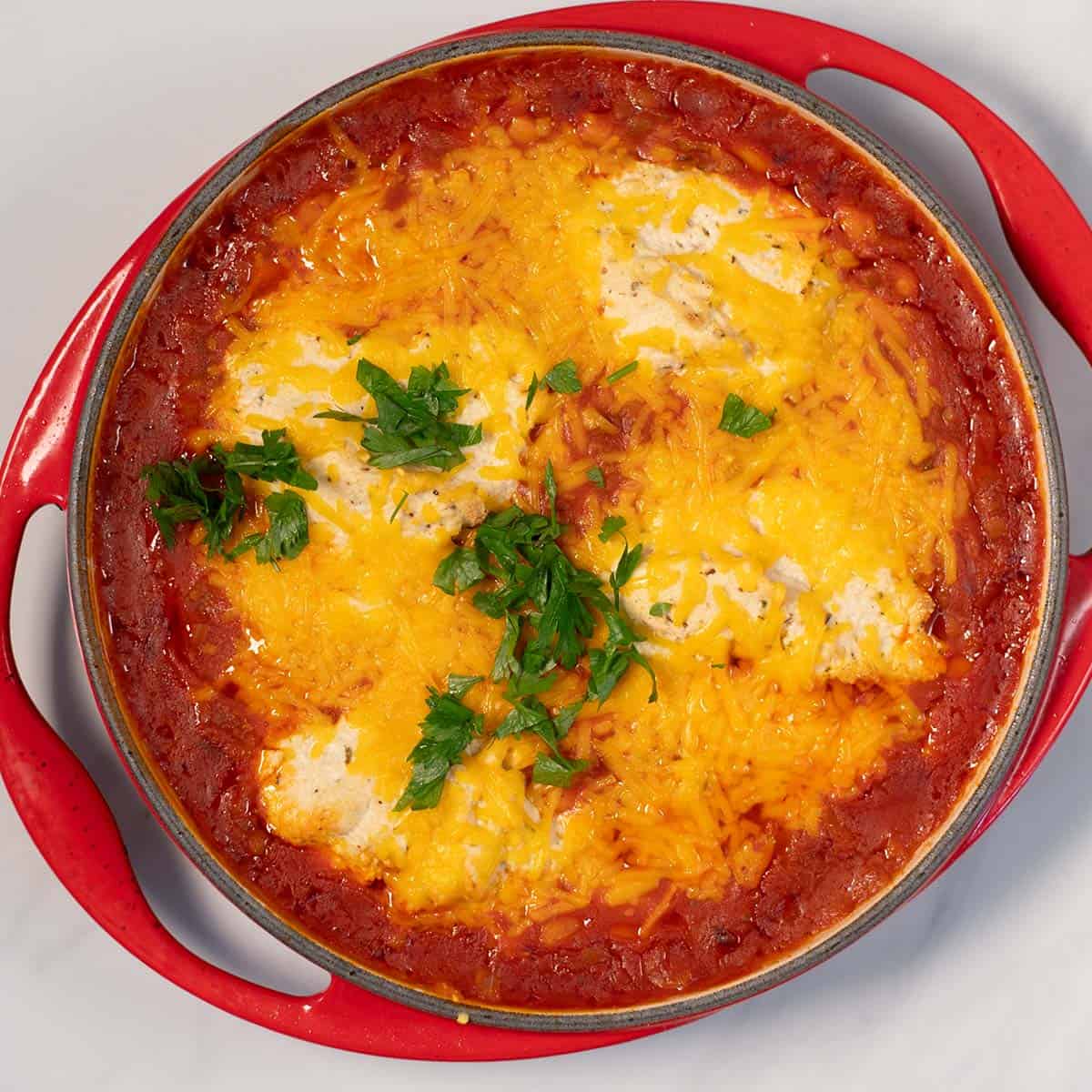 The oven pan with Lasagna Beans after baking with a golden crust.