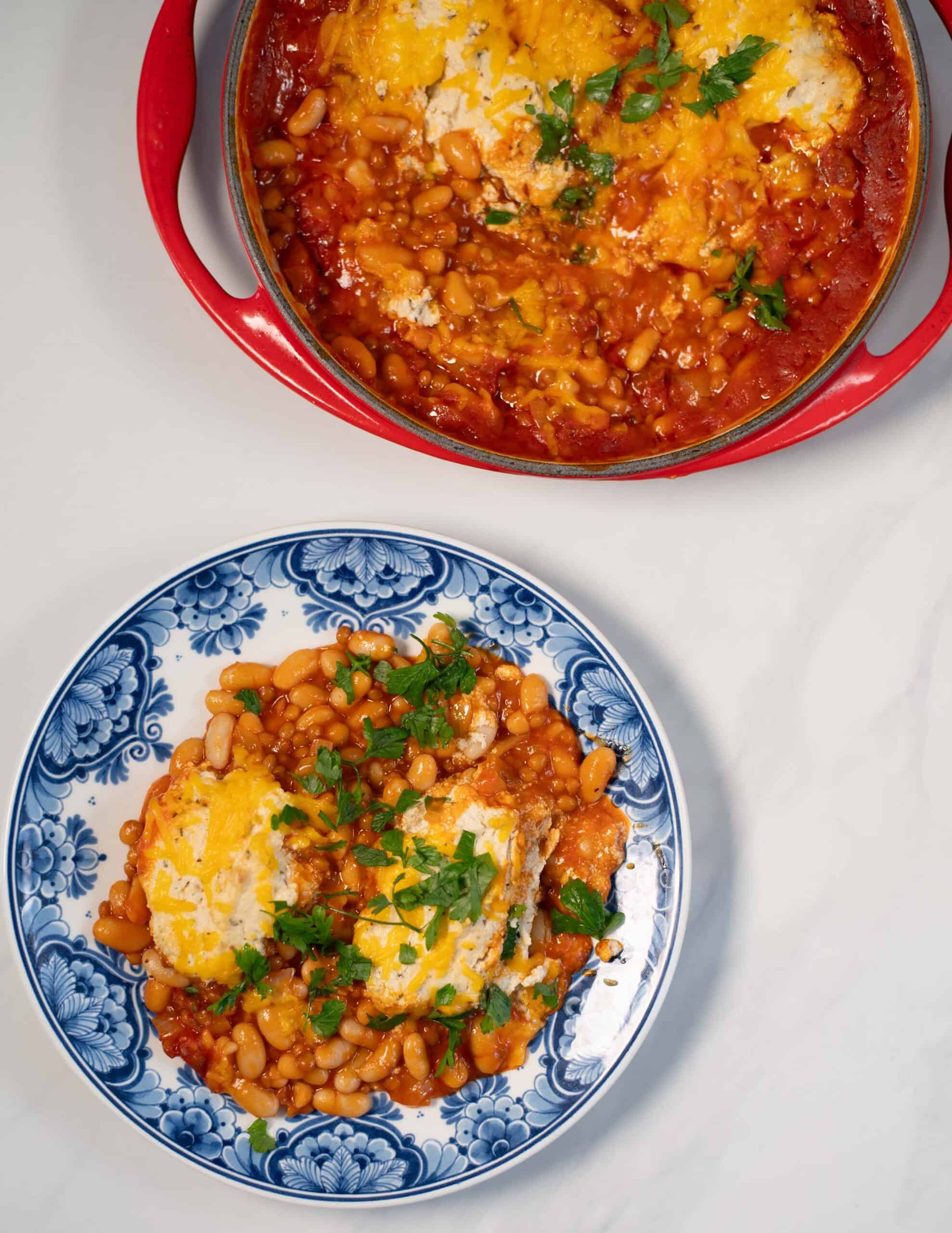 A serving of Lesagna Beans with pan in the background.