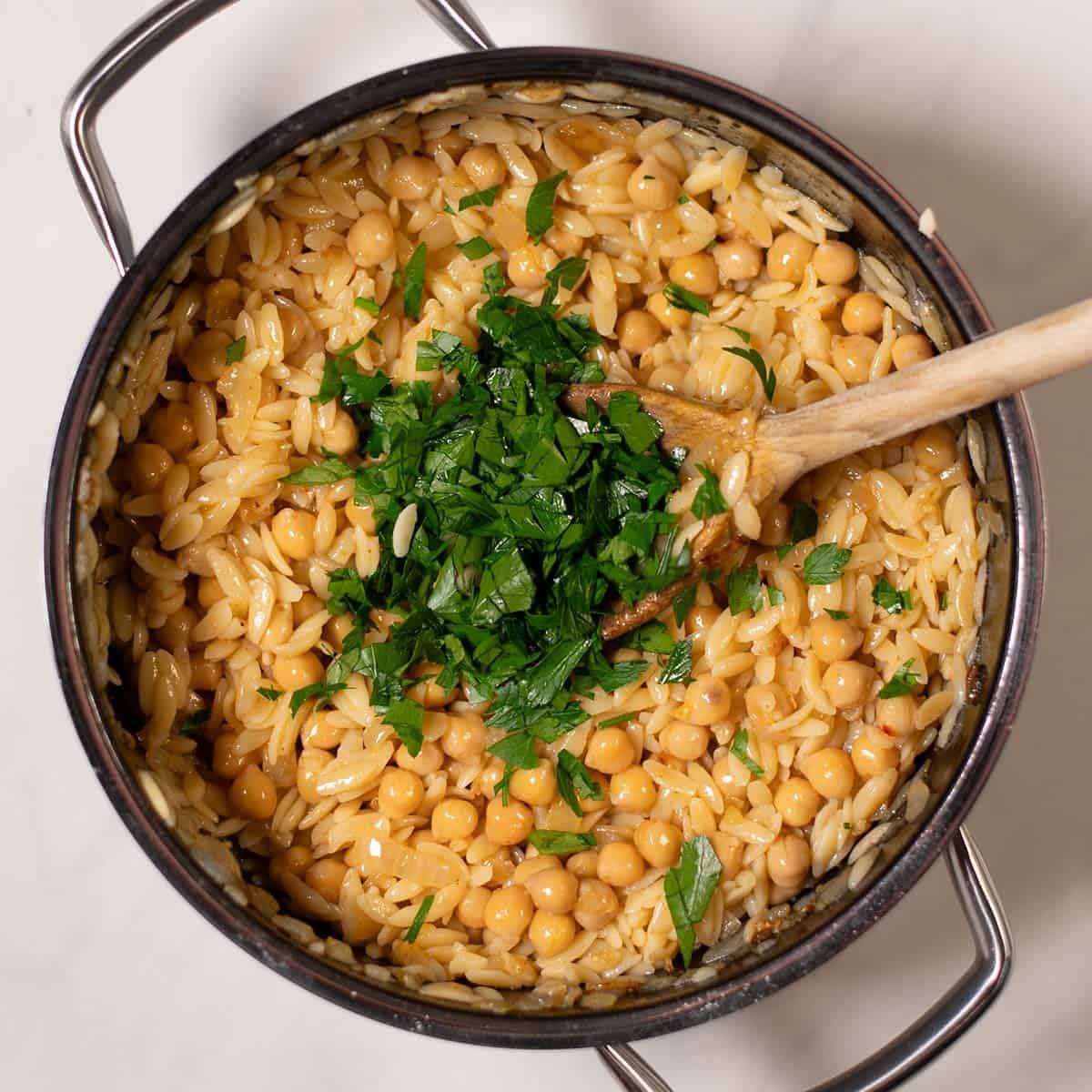 Fresh parsley added to the Lemon Butter Orzo.