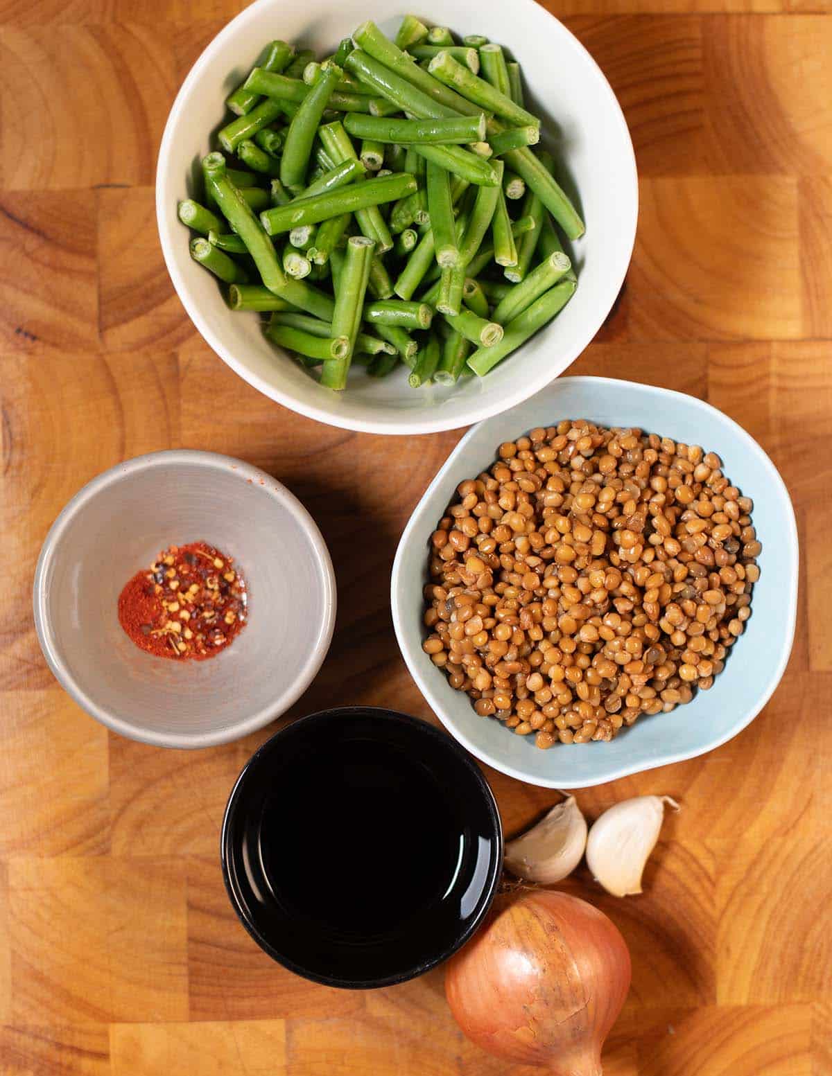 Fresh green beans and cooked lentils with garlic and soy sauce.