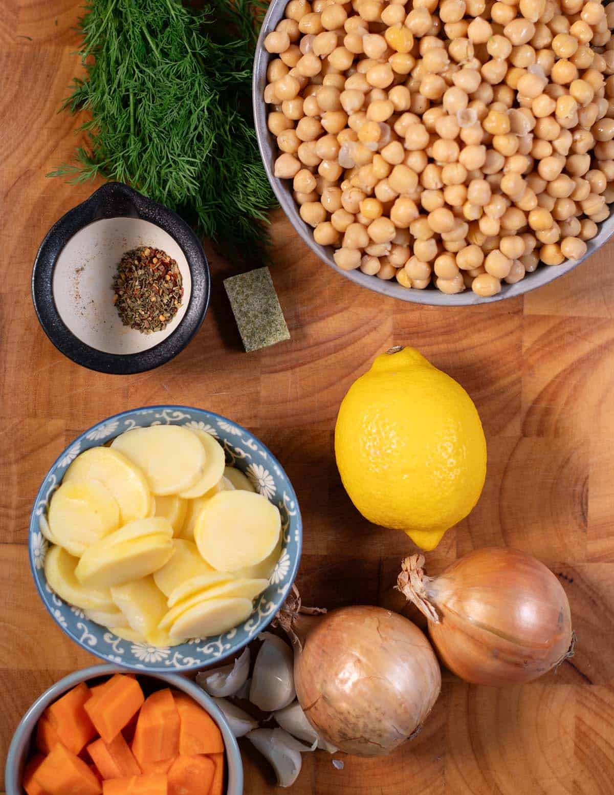 Chickpeas, lemon, onions, garlic, and spices for Greek soup.